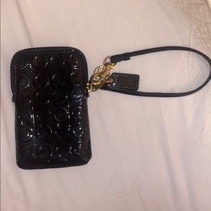 Coach clutch/universal case